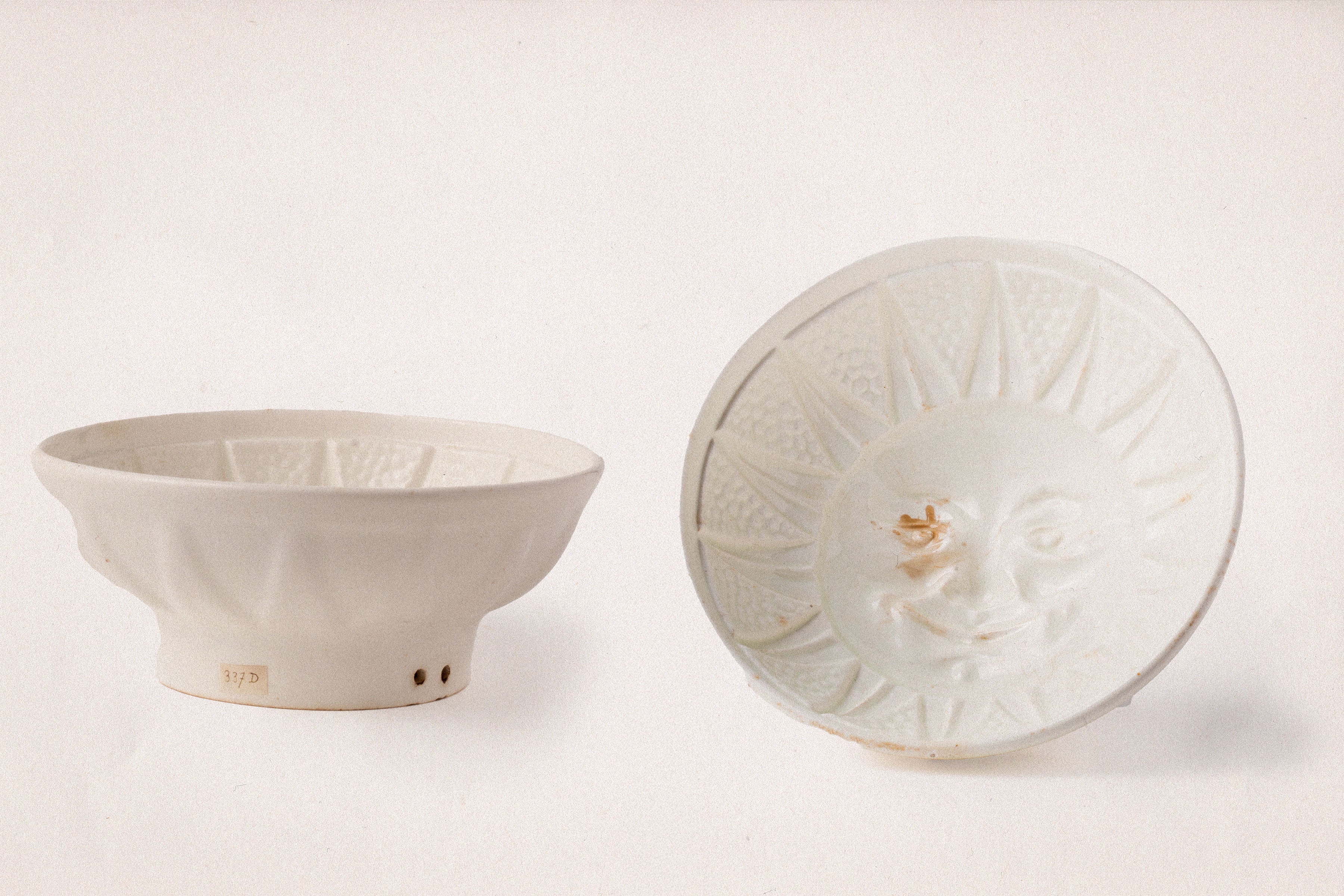 Antique Embossed Face Pudding Bowl