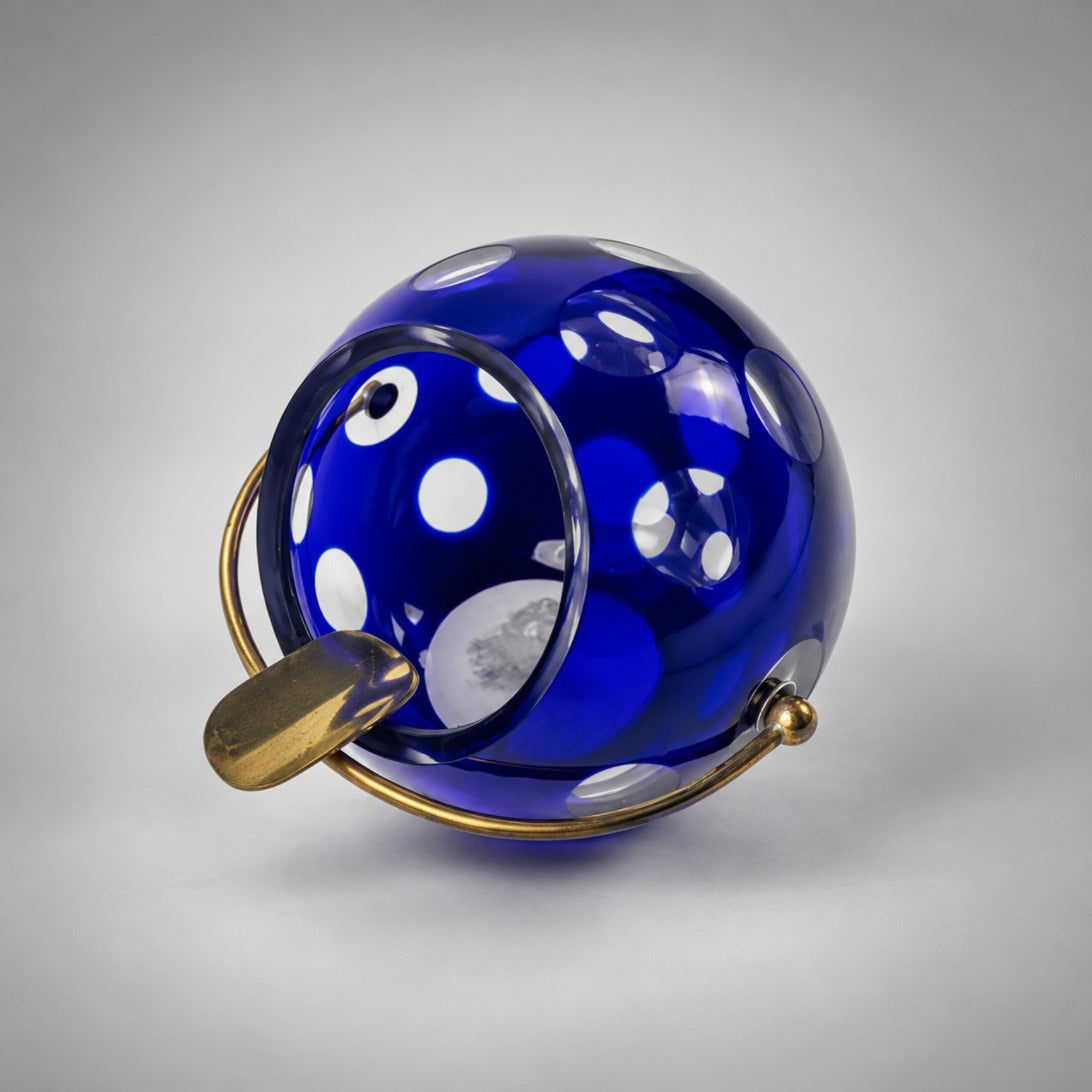Cobalt glass orb ashtray, opening and brass rest
