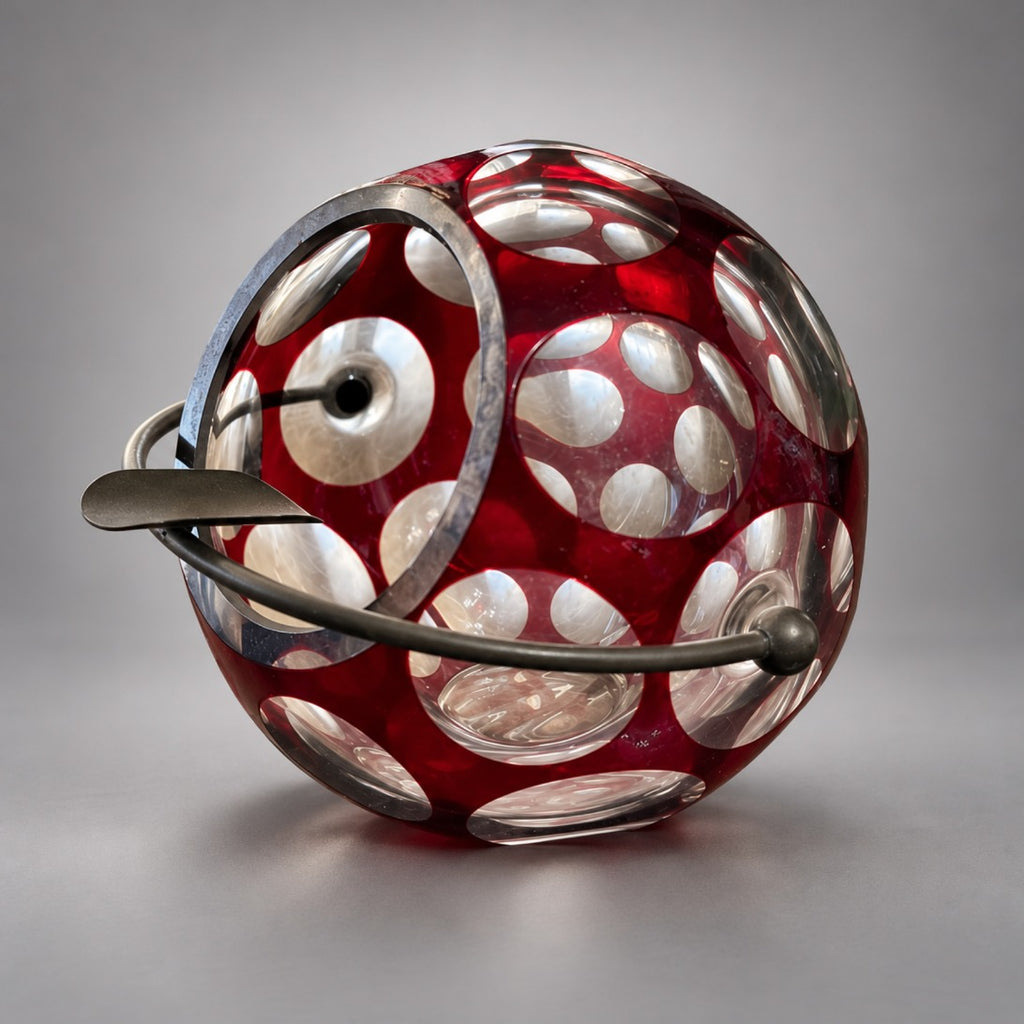 Ruby red cut-to-clear glass orb ashtray, side with rest