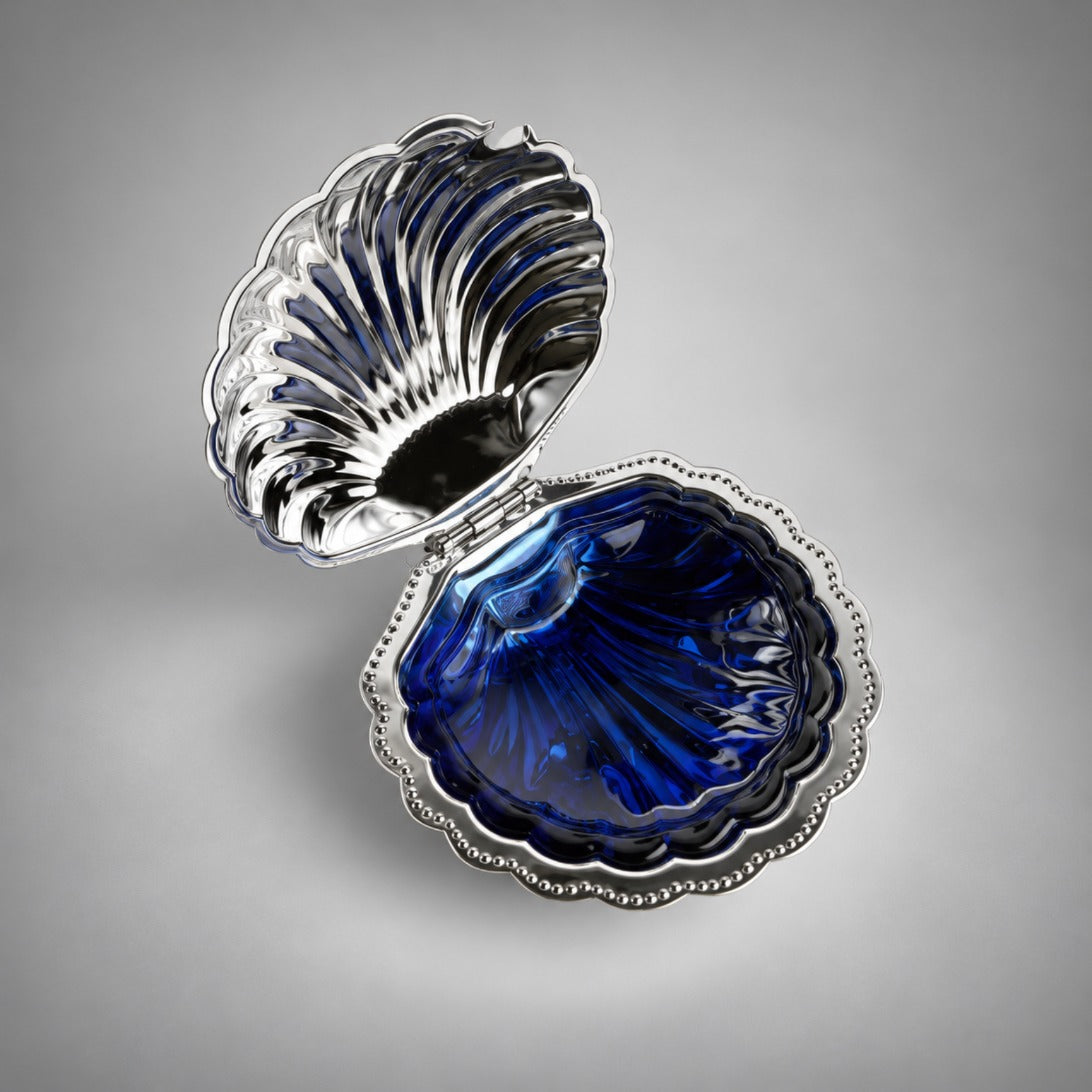 Shell caviar server from above with cobalt glass insert